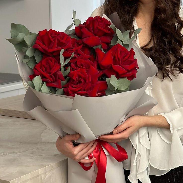 Professional floral arrangement in modern corporate setting